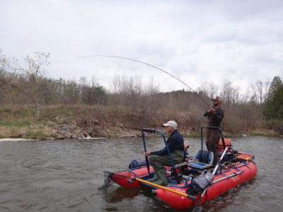 Tailwater Drifters guide launching a drift boat for a catch & release float  trip fly fishing on the Red Deer River, Alberta,CA Stock Photo - Alamy